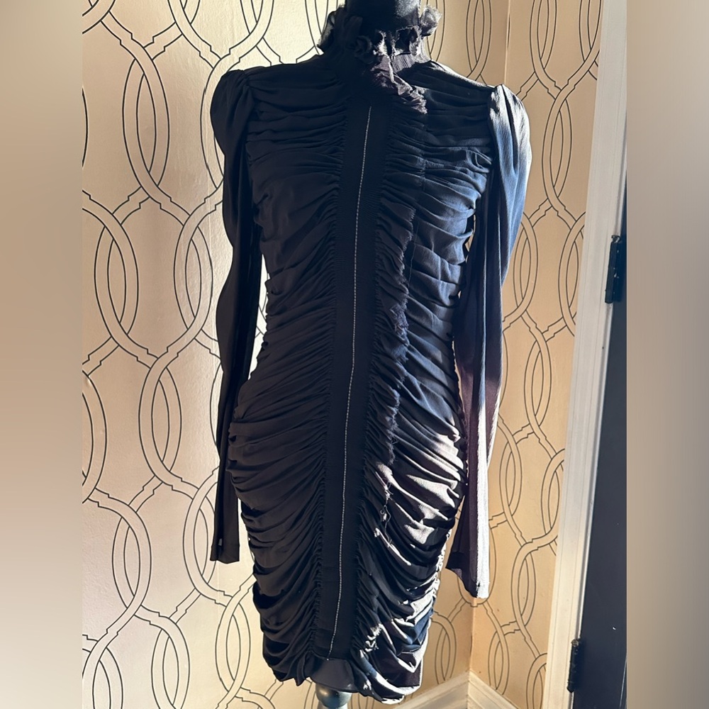 Louis Vuitton black silk dress with back full zipper and long sleeve.